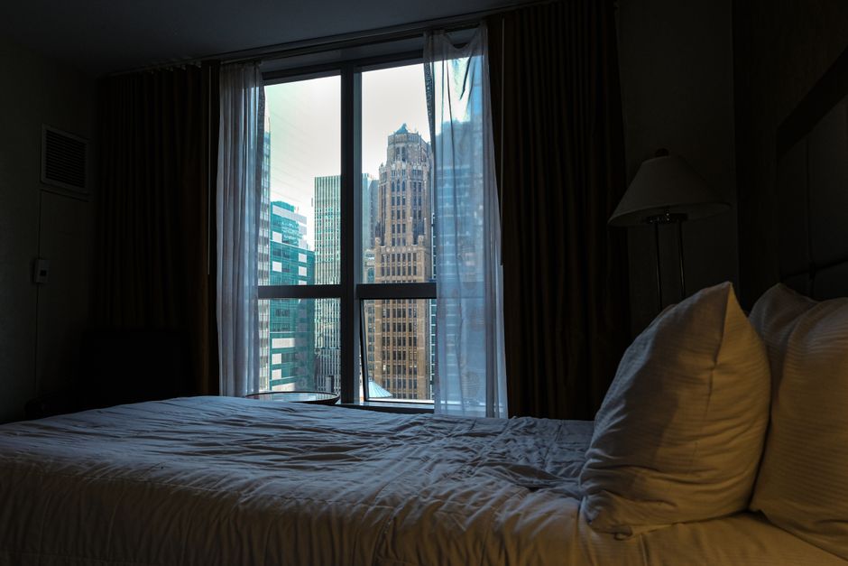 Quiet bedroom at night with soft light through the window